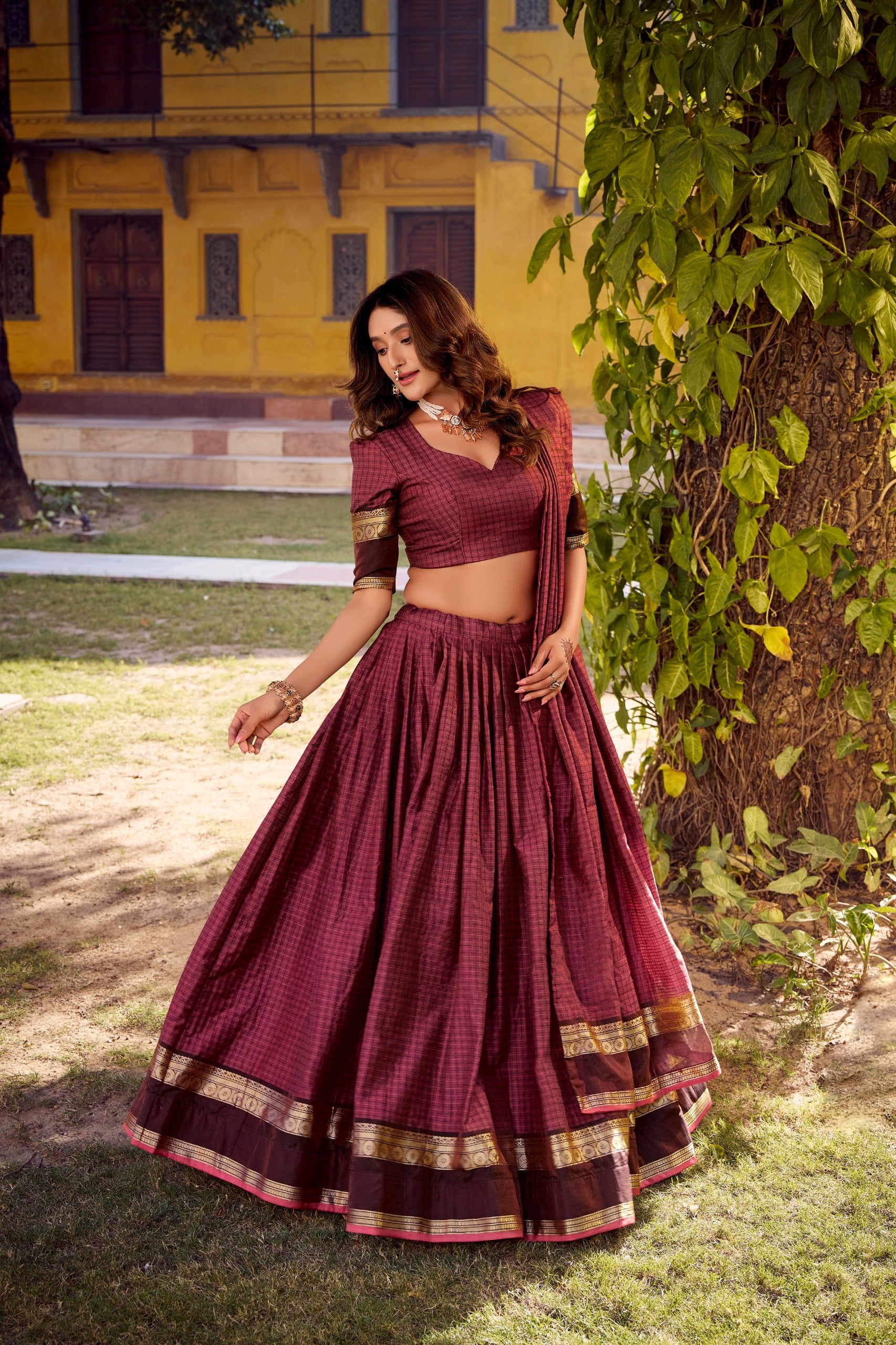 Traditional maroon lehanga with gold border 
