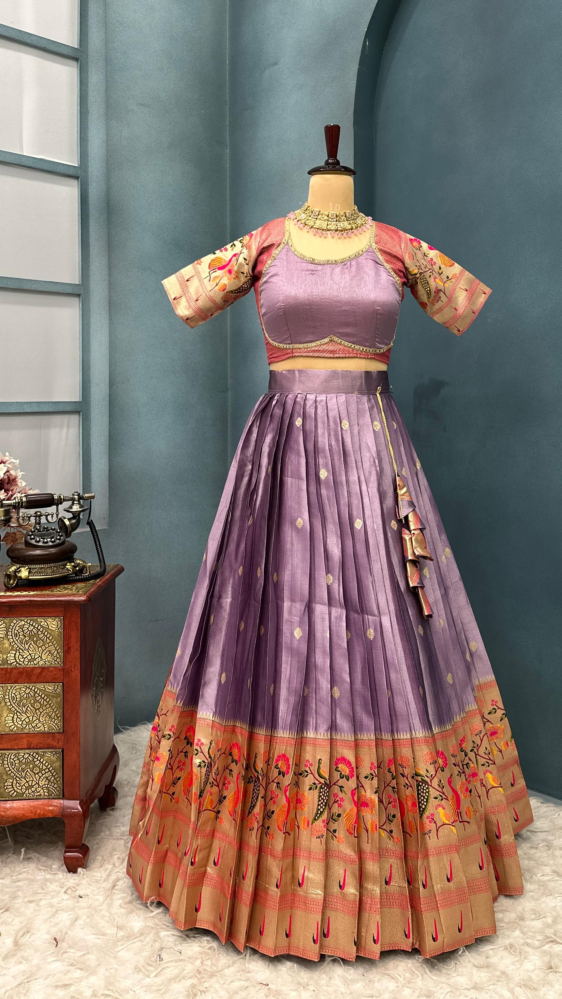 Lavender with Red Traditional outfit on a mannequin against a blue wall
