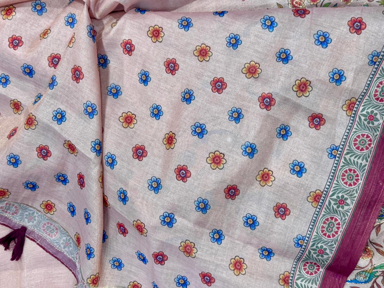 Blush pink Floral patterned fabric with colorful flowers on a light background