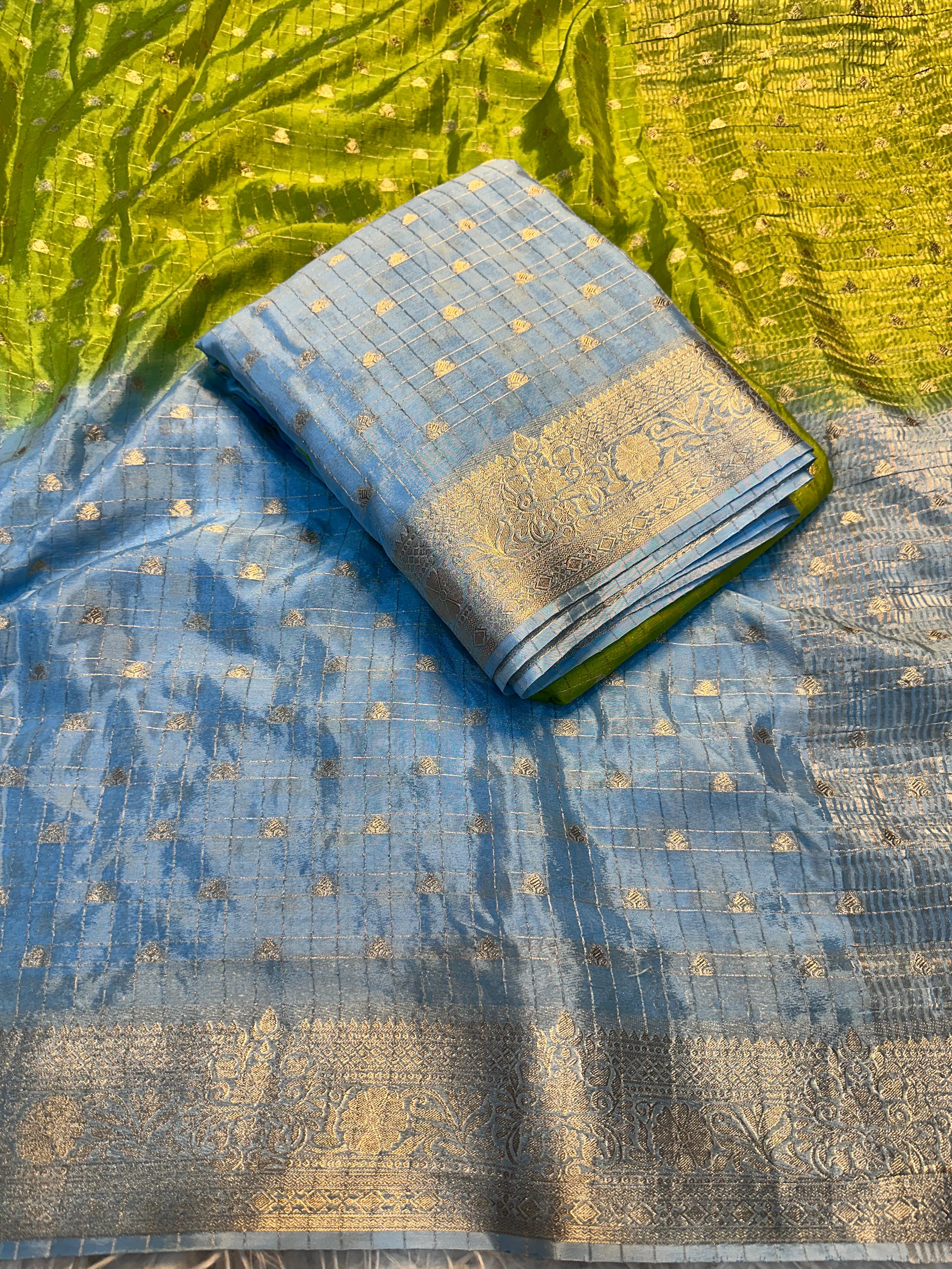 Parrot Green fabric with patterns on a  textured background