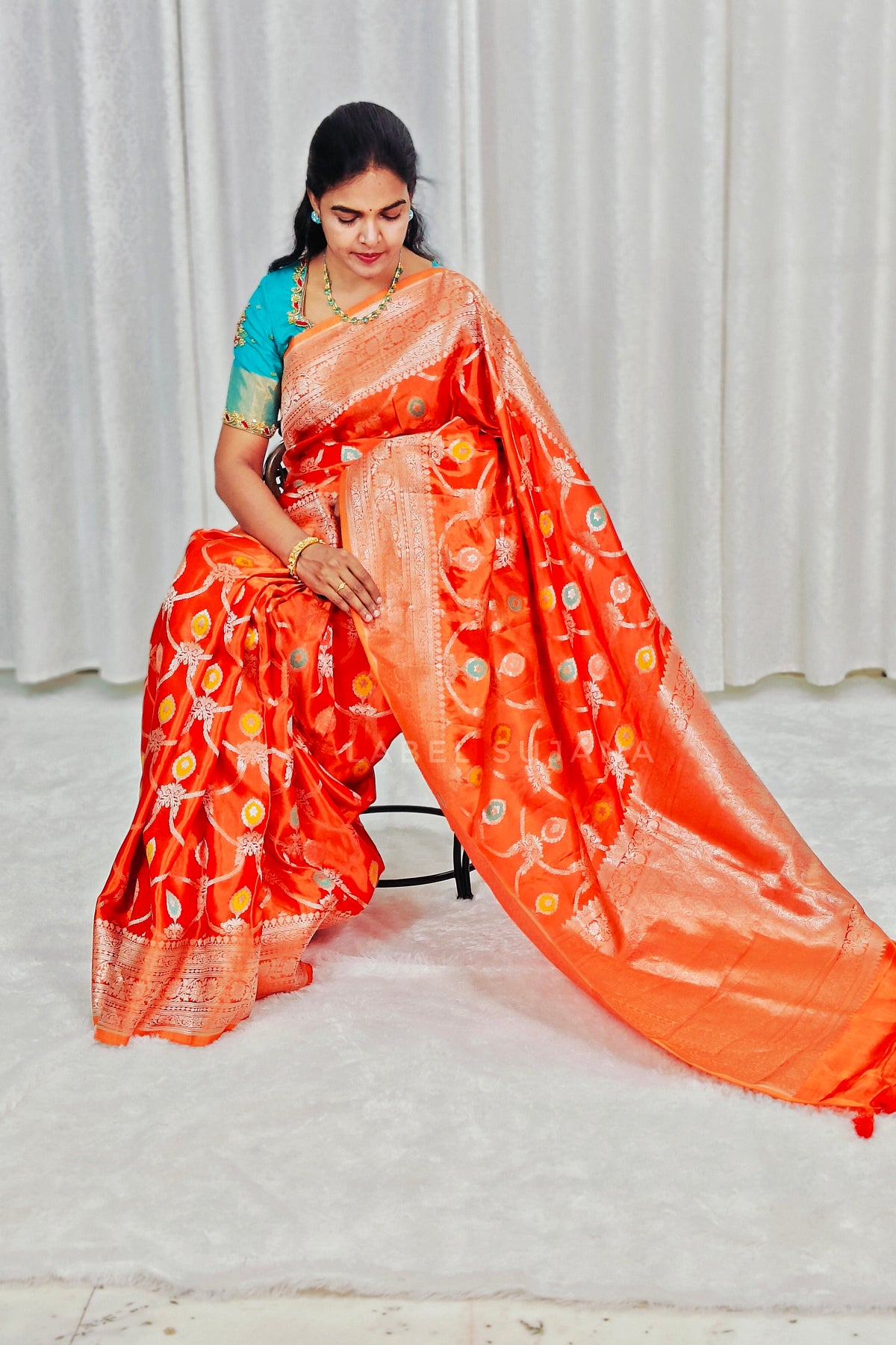 A Rust Orange Silk Saree