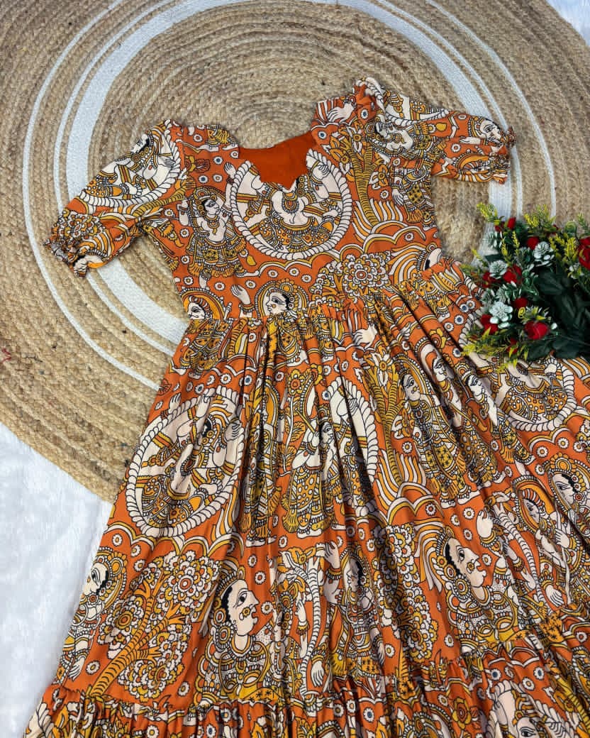 Orange frock with intricate patterns 