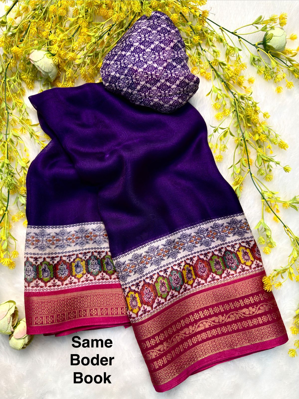 Purple saree with colorful patterns