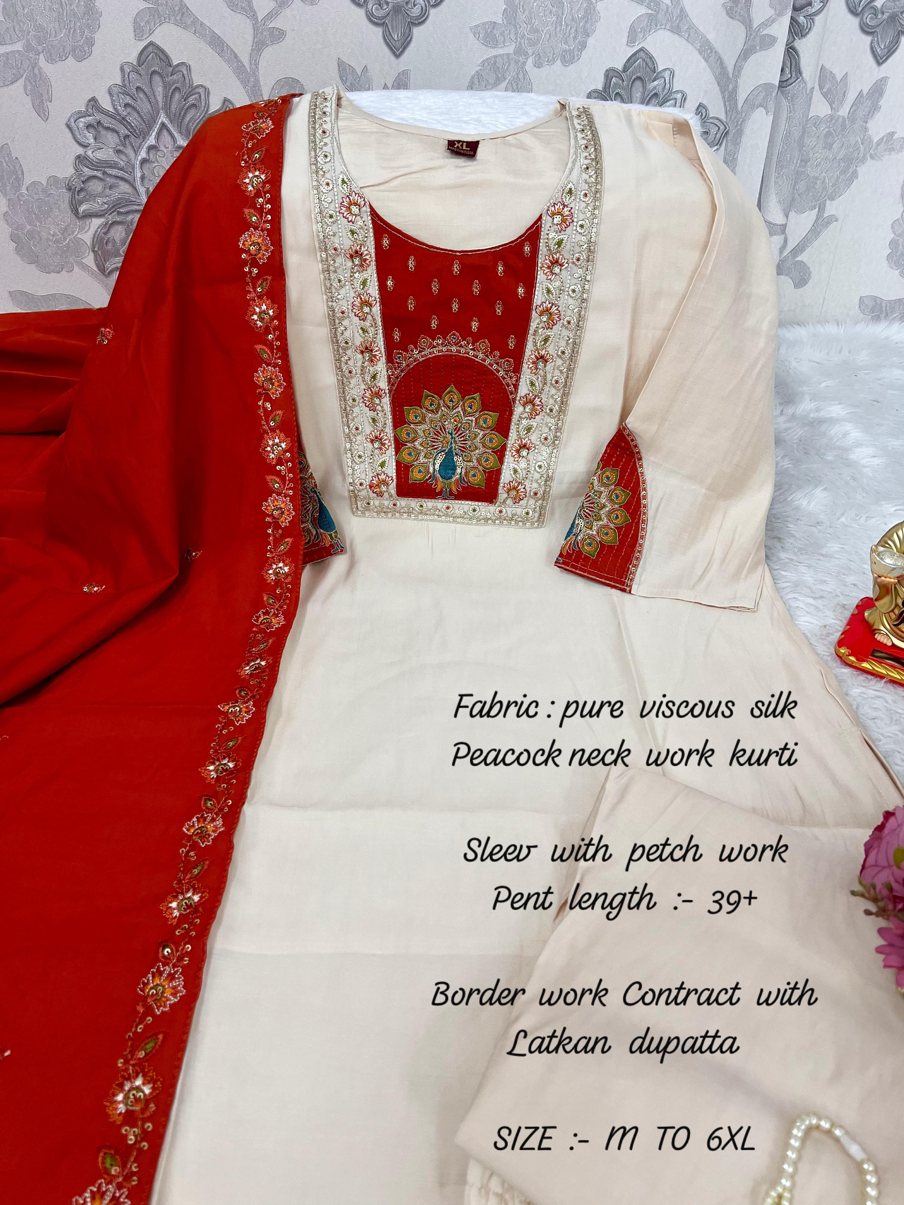  Red embroidery kurti with detailed text on fabric and size information.