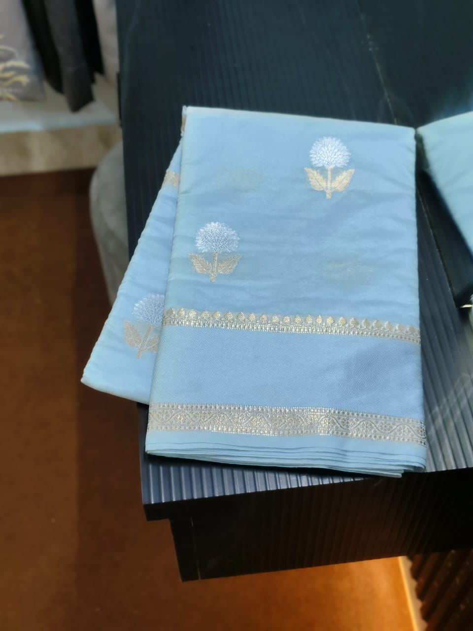 Sky blue fabric with floral patterns 