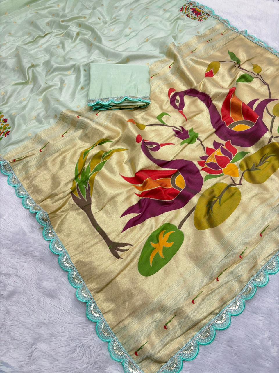 Light green saree with floral patterns 