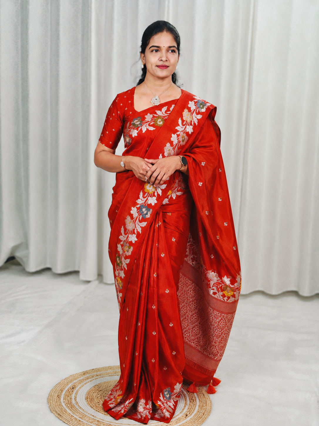 A rust orange silk saree 