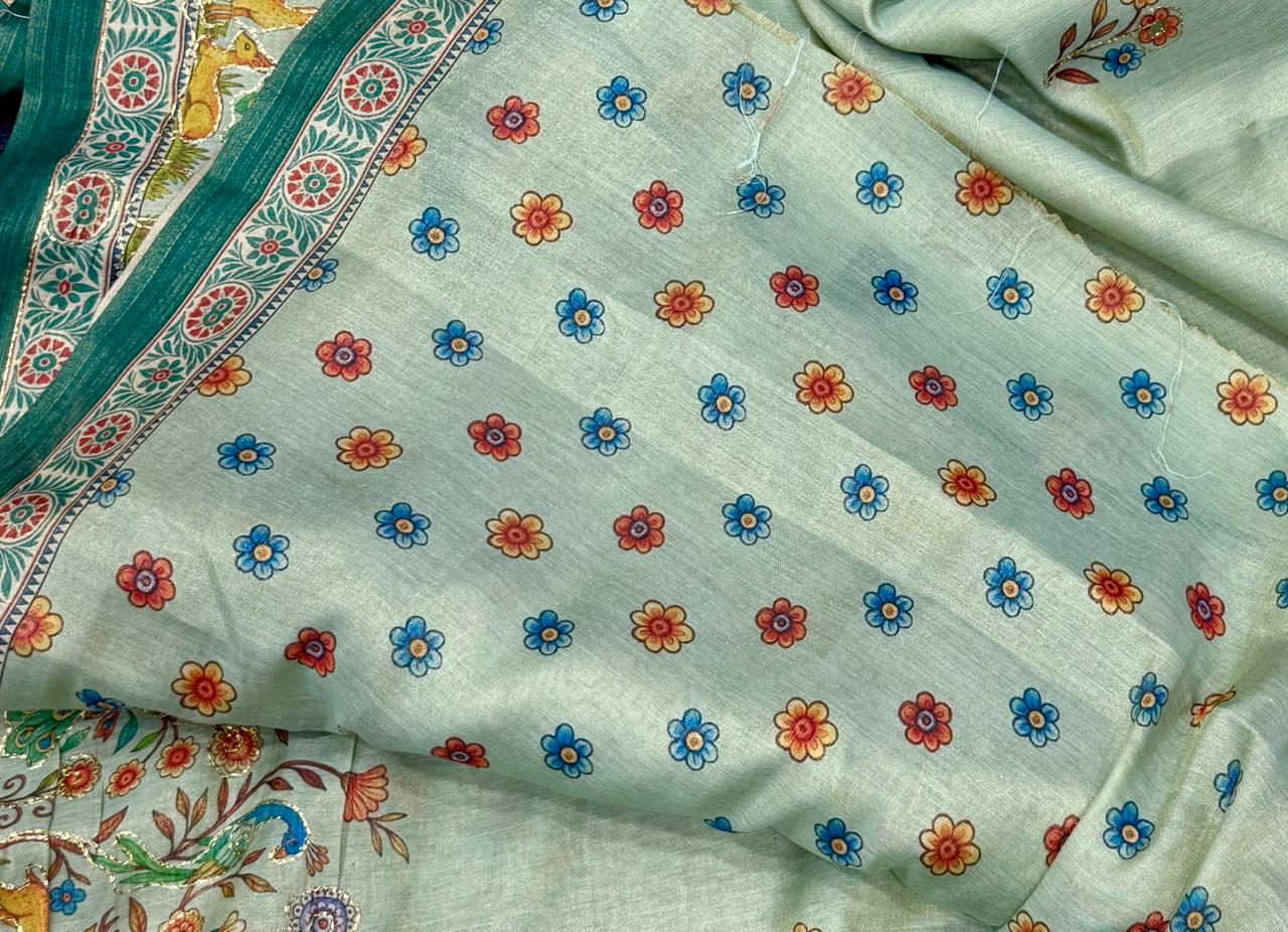 Pista green fabric with floral pattern on a light background