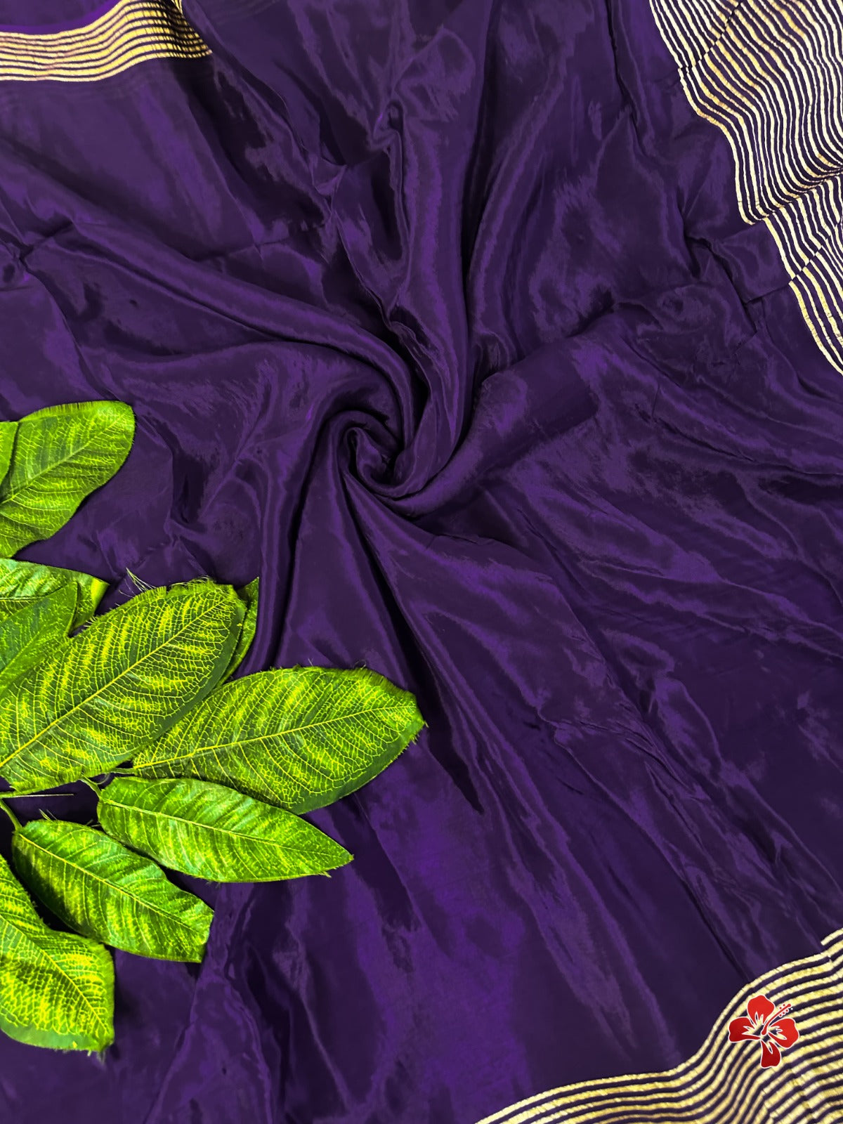 Purple saree with gold accents