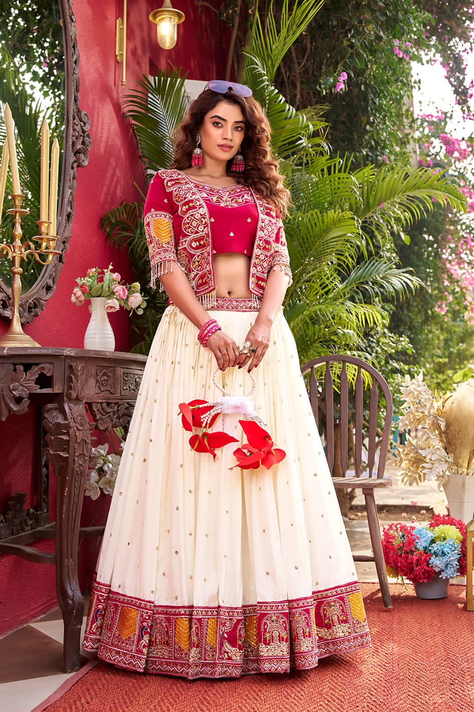 traditional outfit with pink blouse and white skirt