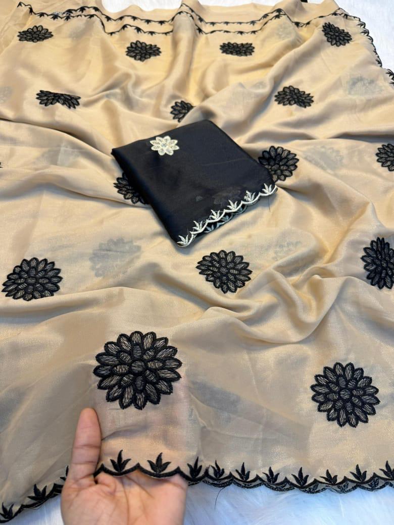 beige fabric with black floral patterns