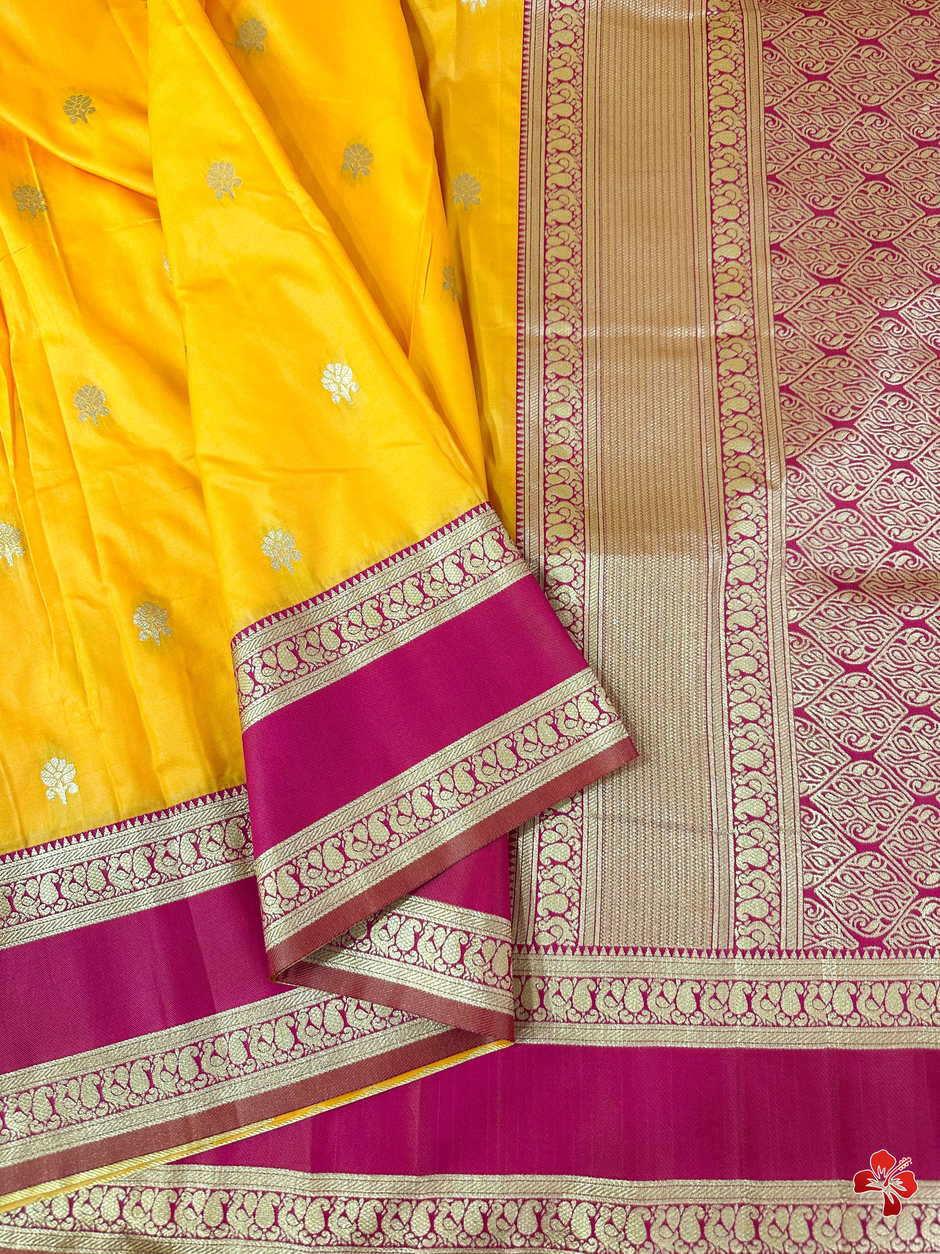 Yellow  saree with intricate patterns