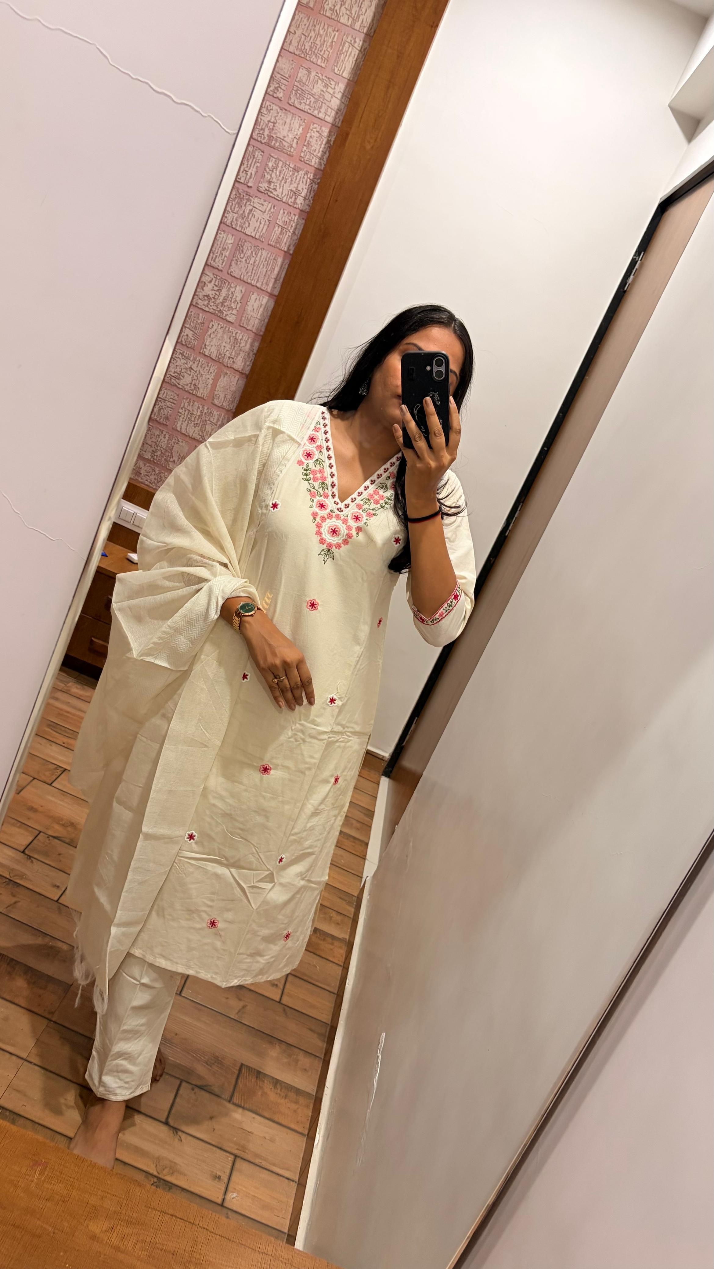 White dress with embroidery work 
