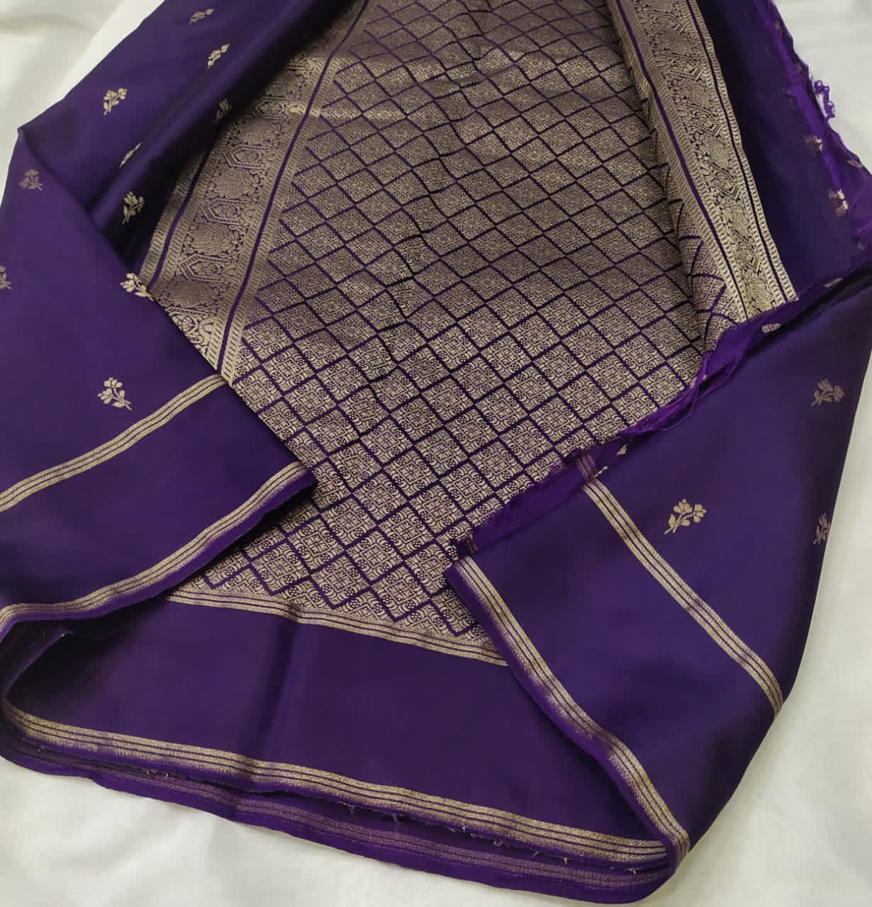 Purple fabric with intricate  patterns