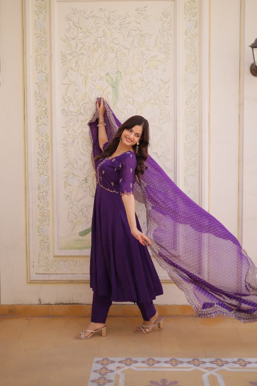  purple traditional outfit with a matching dupatta