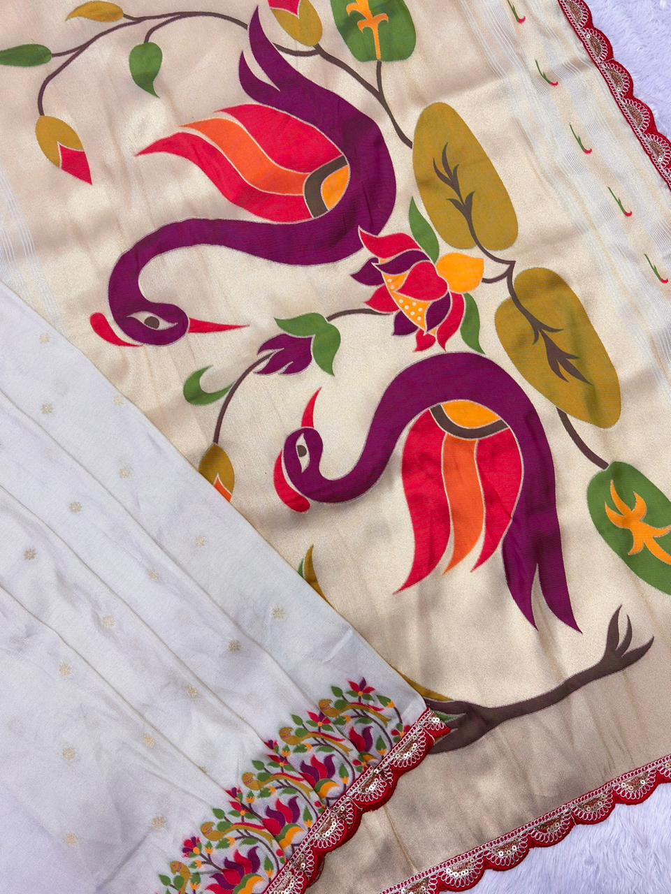 Decorative white fabric with colorful and flower design on a white background