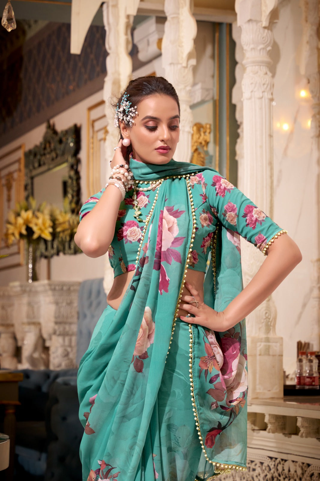Rama Green saree with floral patterns 