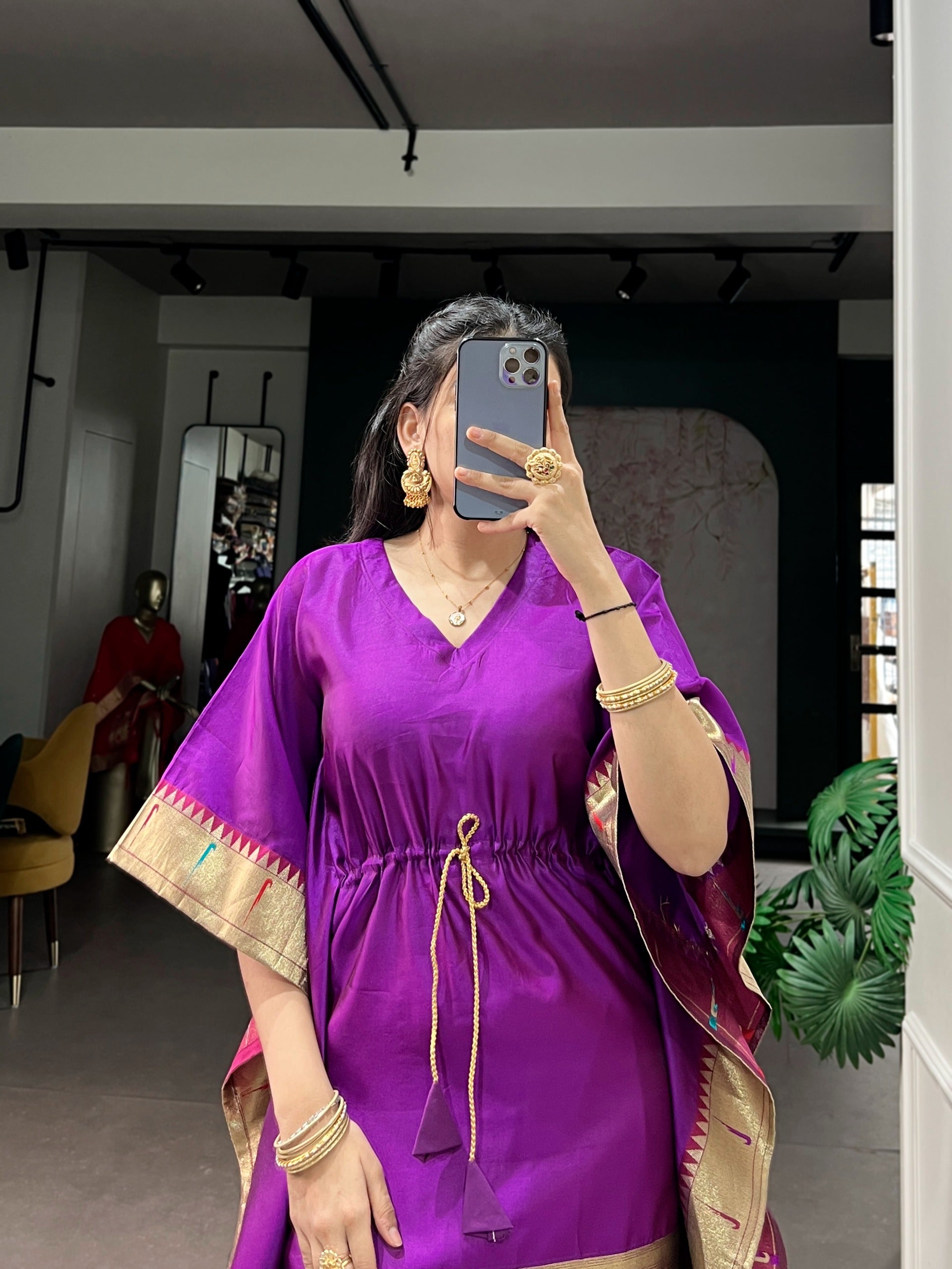 purple dress with gold accents 