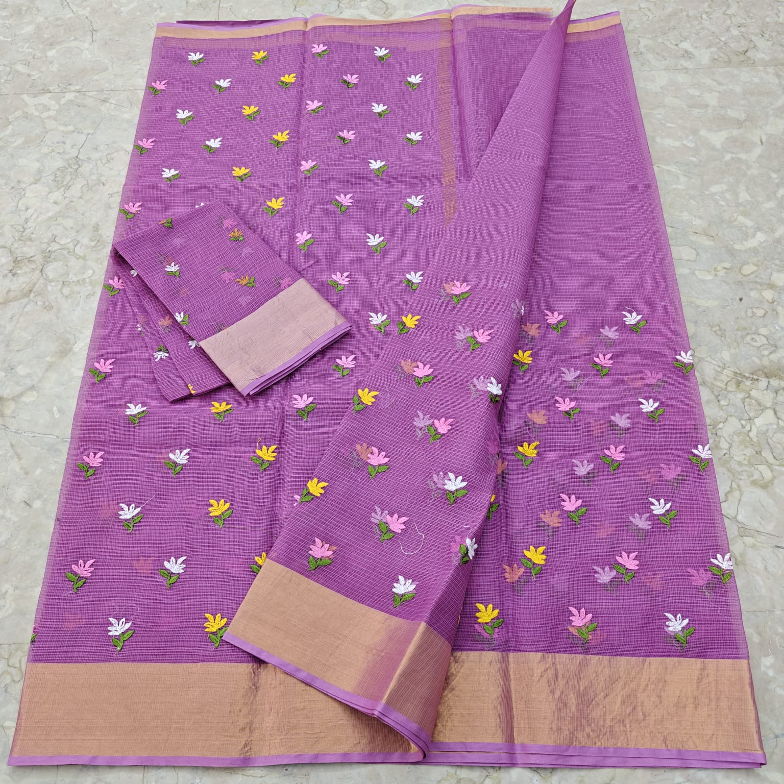 Lavender saree with floral patterns