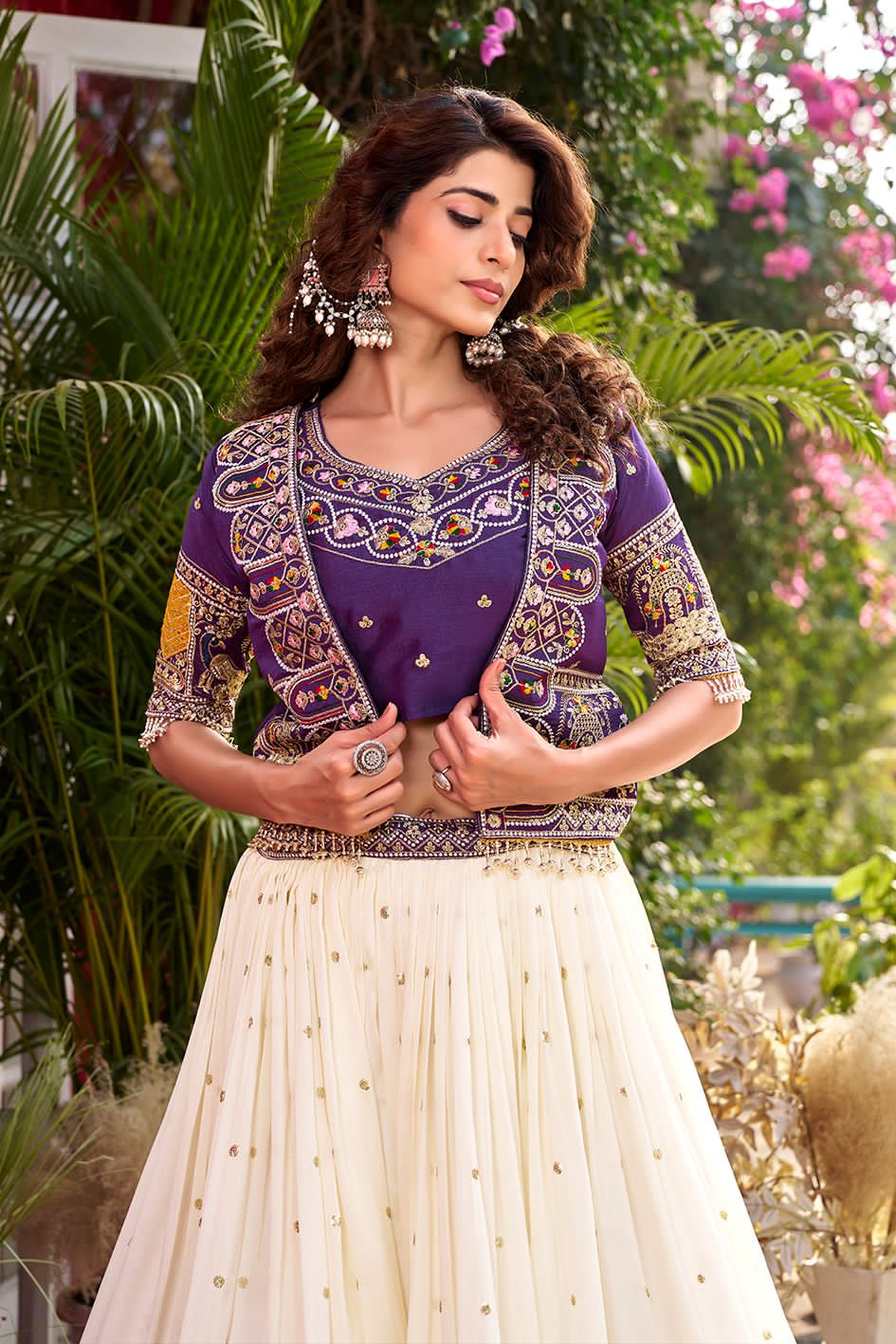  Traditional outfit with white skirt and purple top 