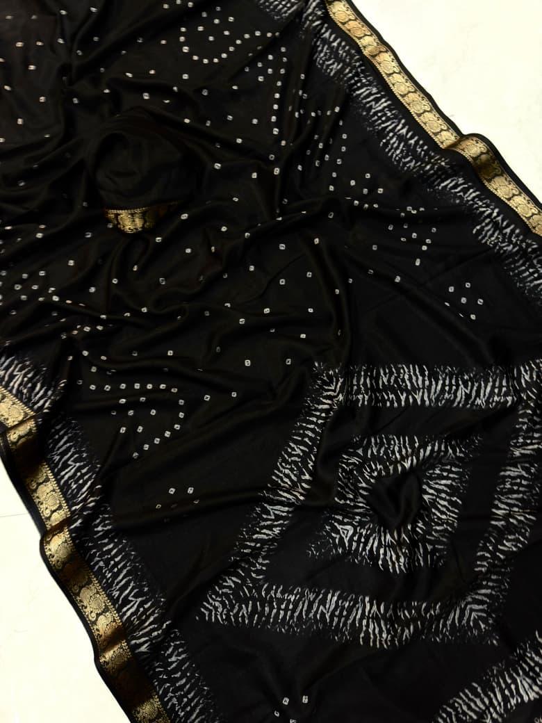 Black fabric with gold border 