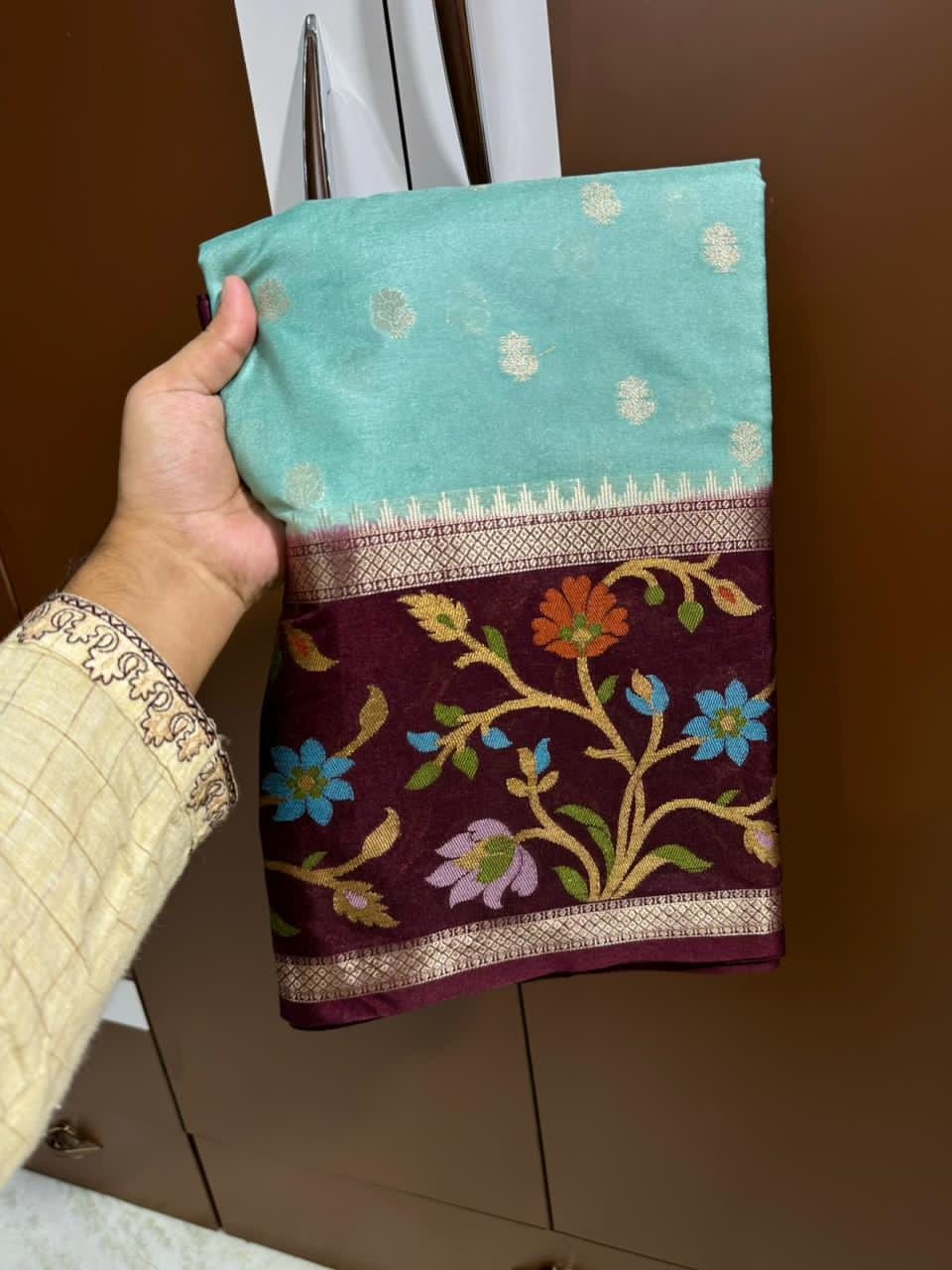 Turquoise Blue saree with floral patterns 