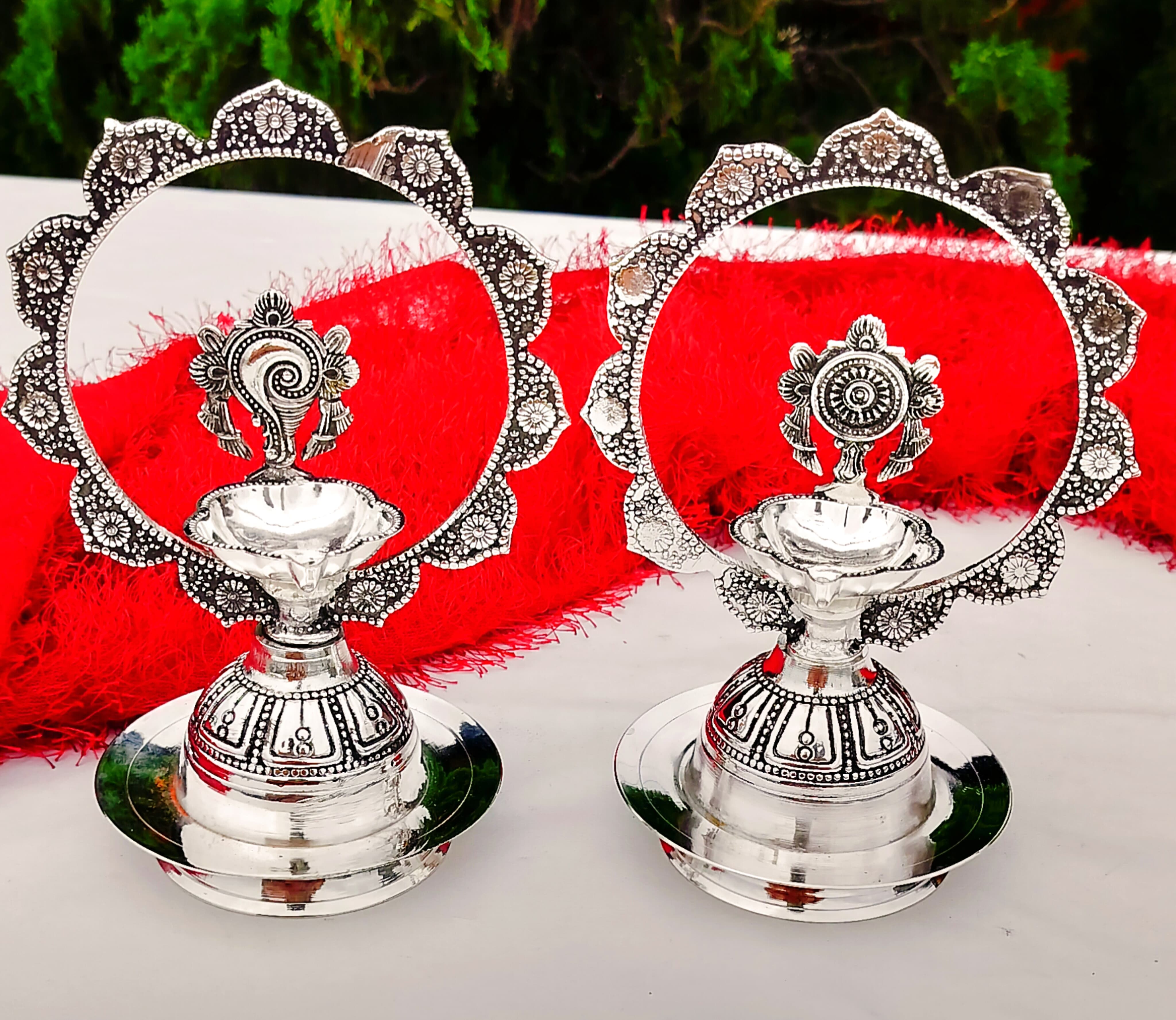 Antique german silver Shanku chakra diya pair