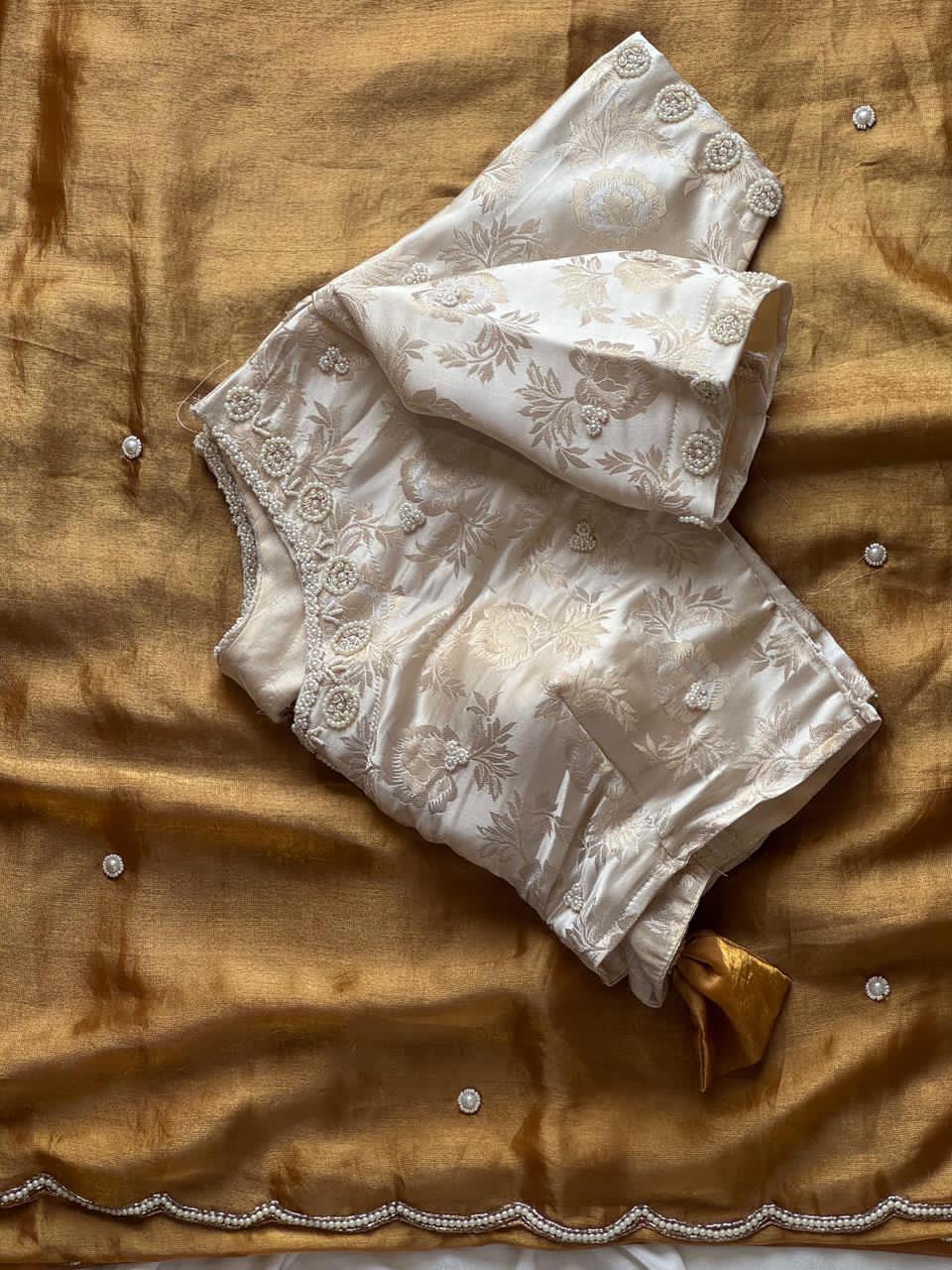 Gold saree with cream blouse 