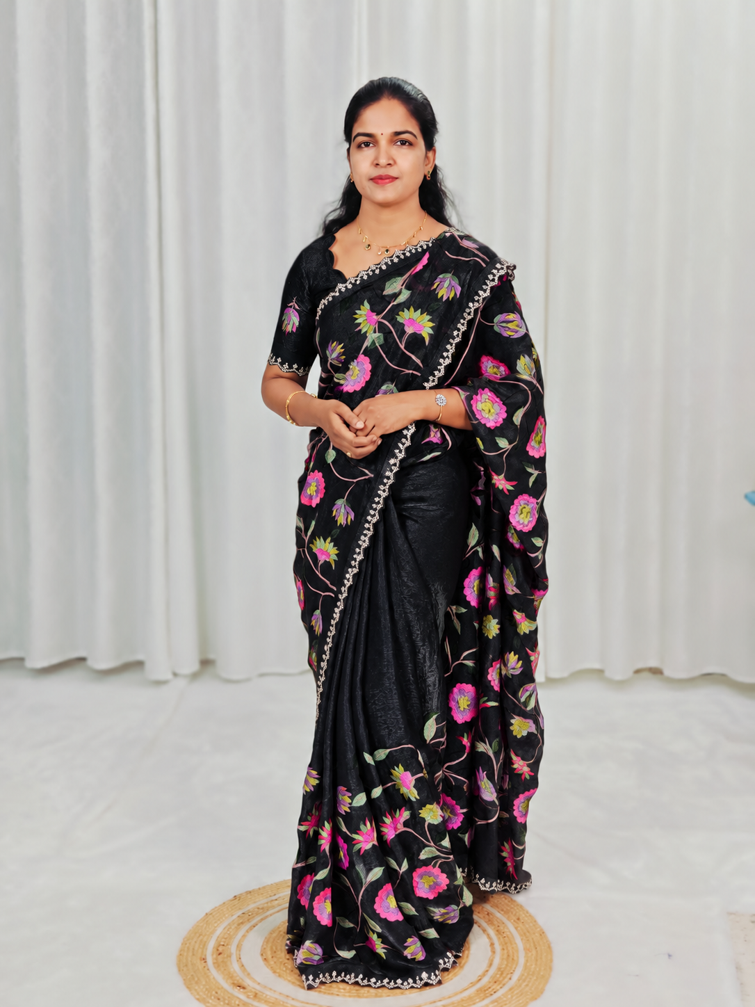 A black embroidery saree with matching blouse