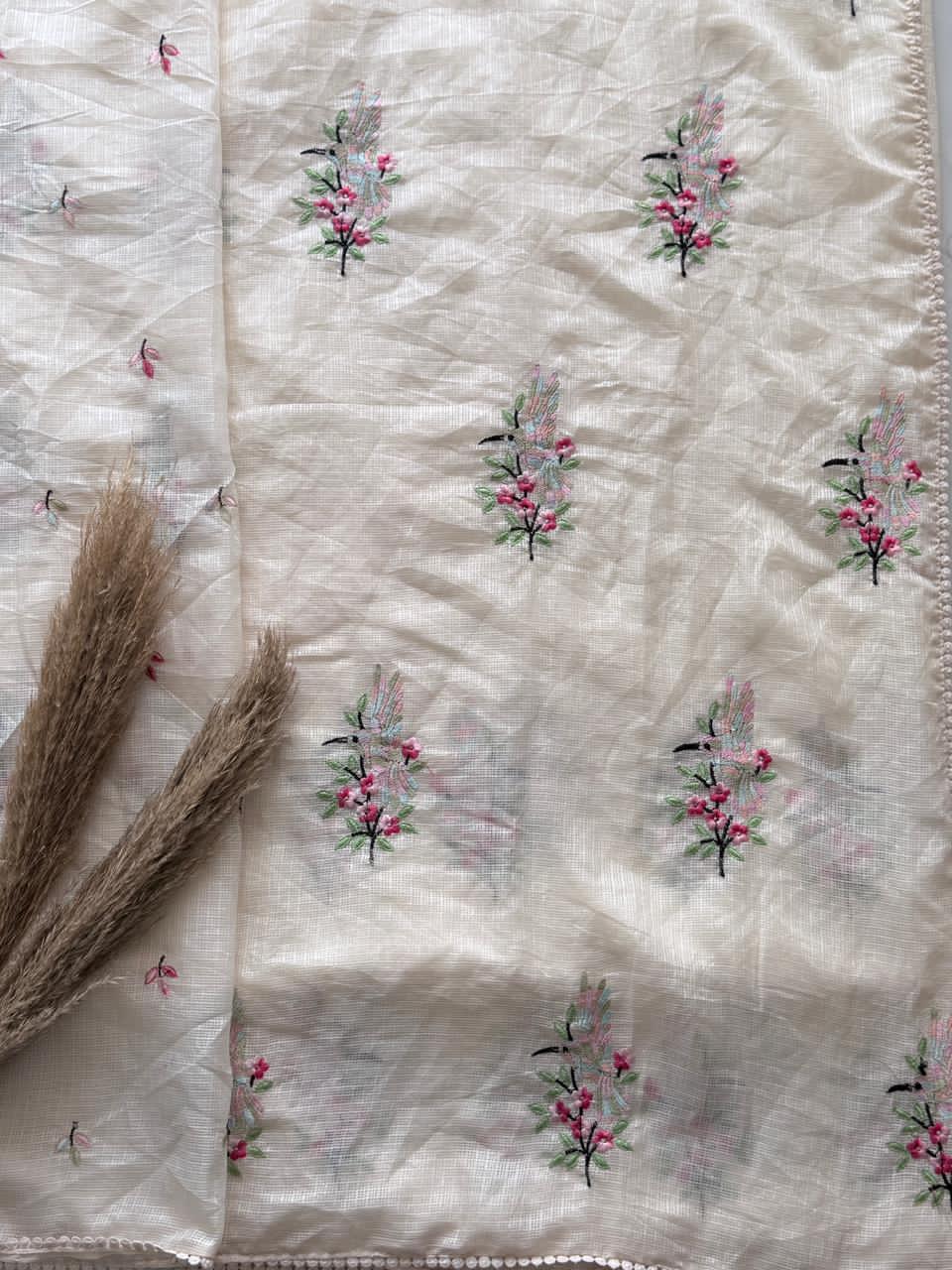 Beige Embroiderey fabric with floral patterns 