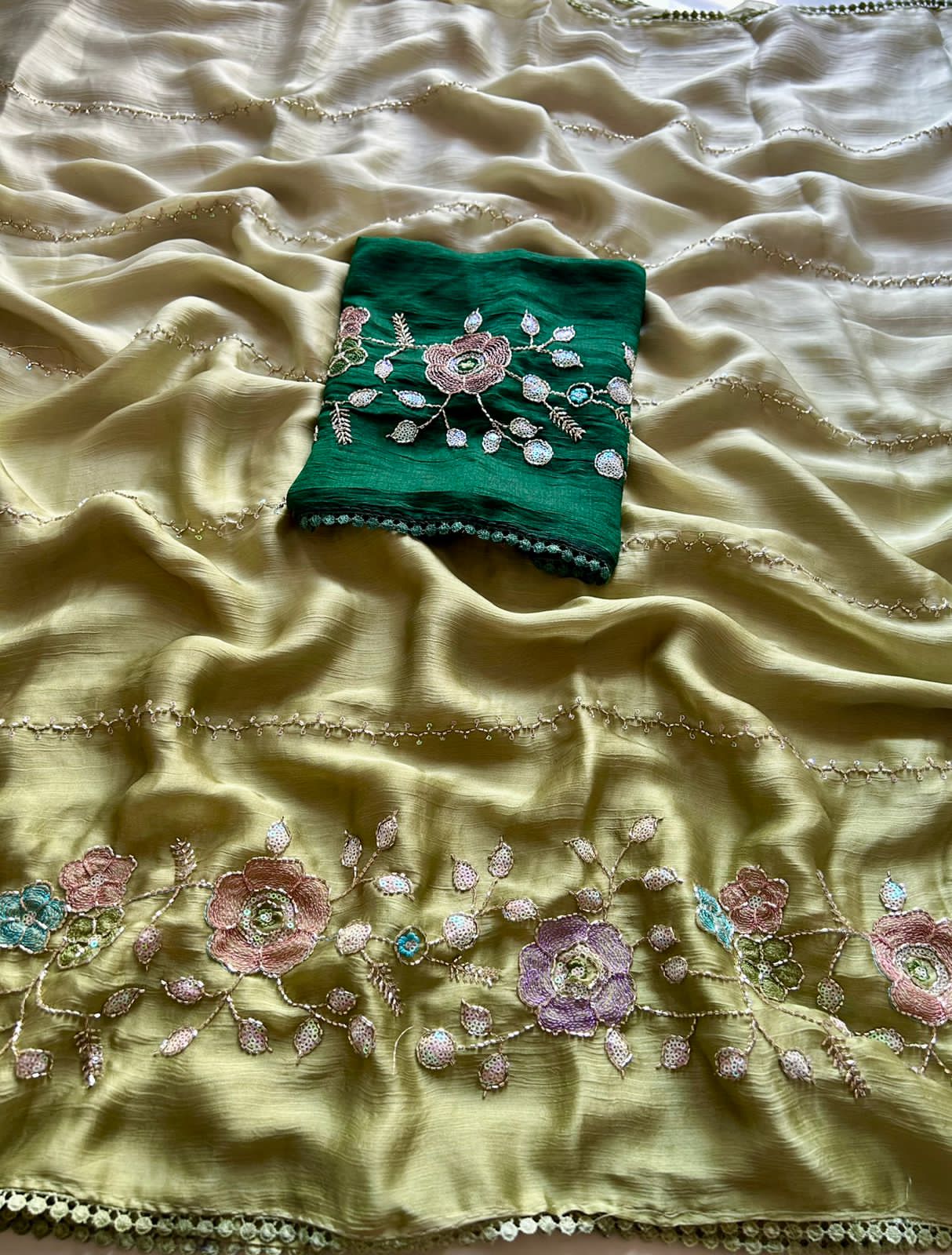 Olive green Embroidered fabric with floral patterns on a yellow background