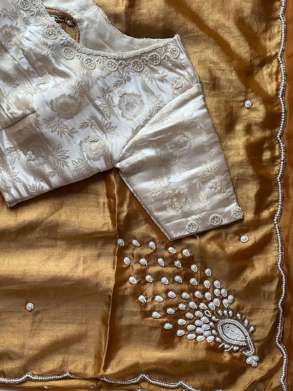 Gold saree with cream blouse 