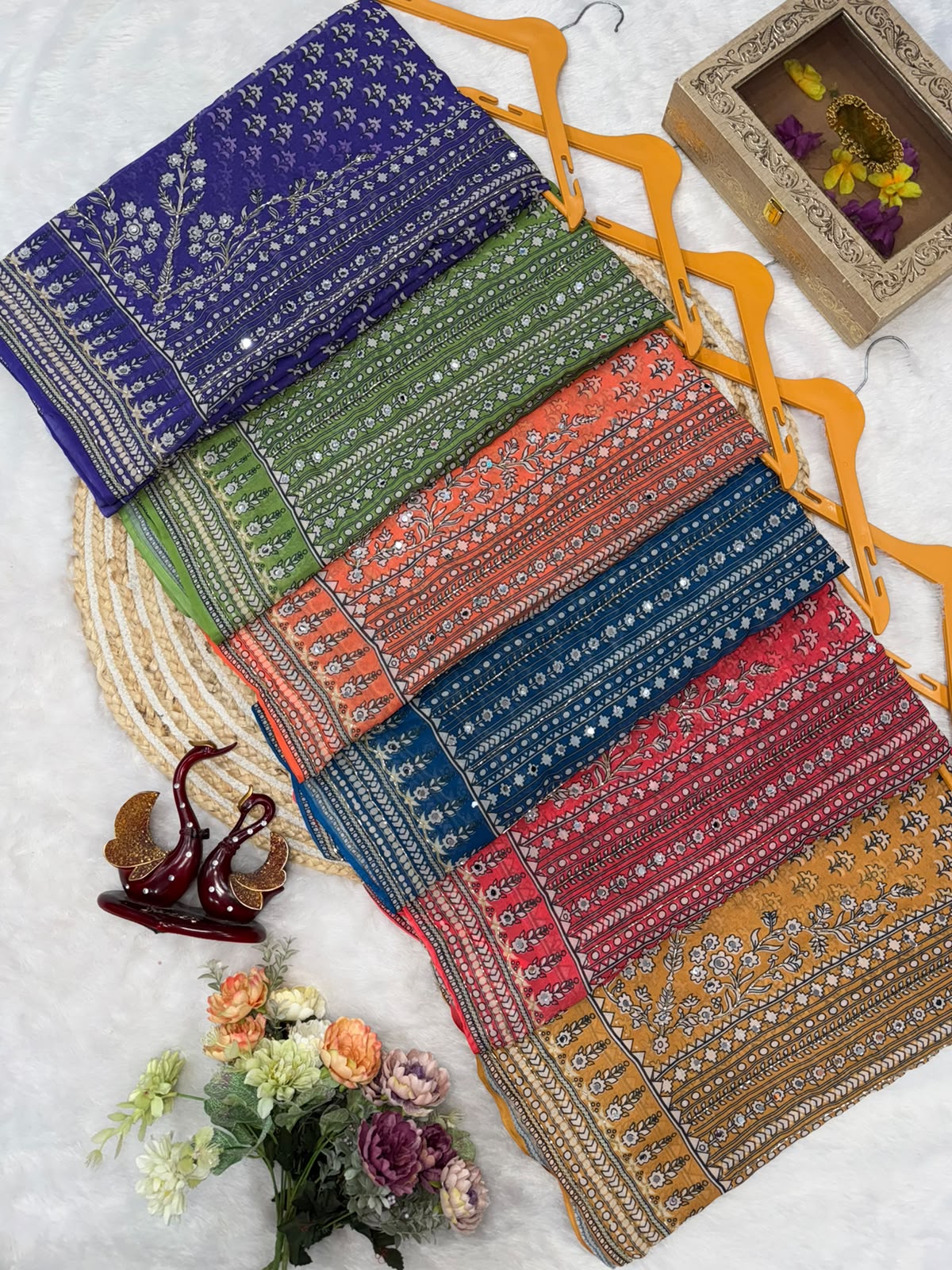 Purple, Mehandi green, orange,blue , vibrant Pink and mustard Yellow 