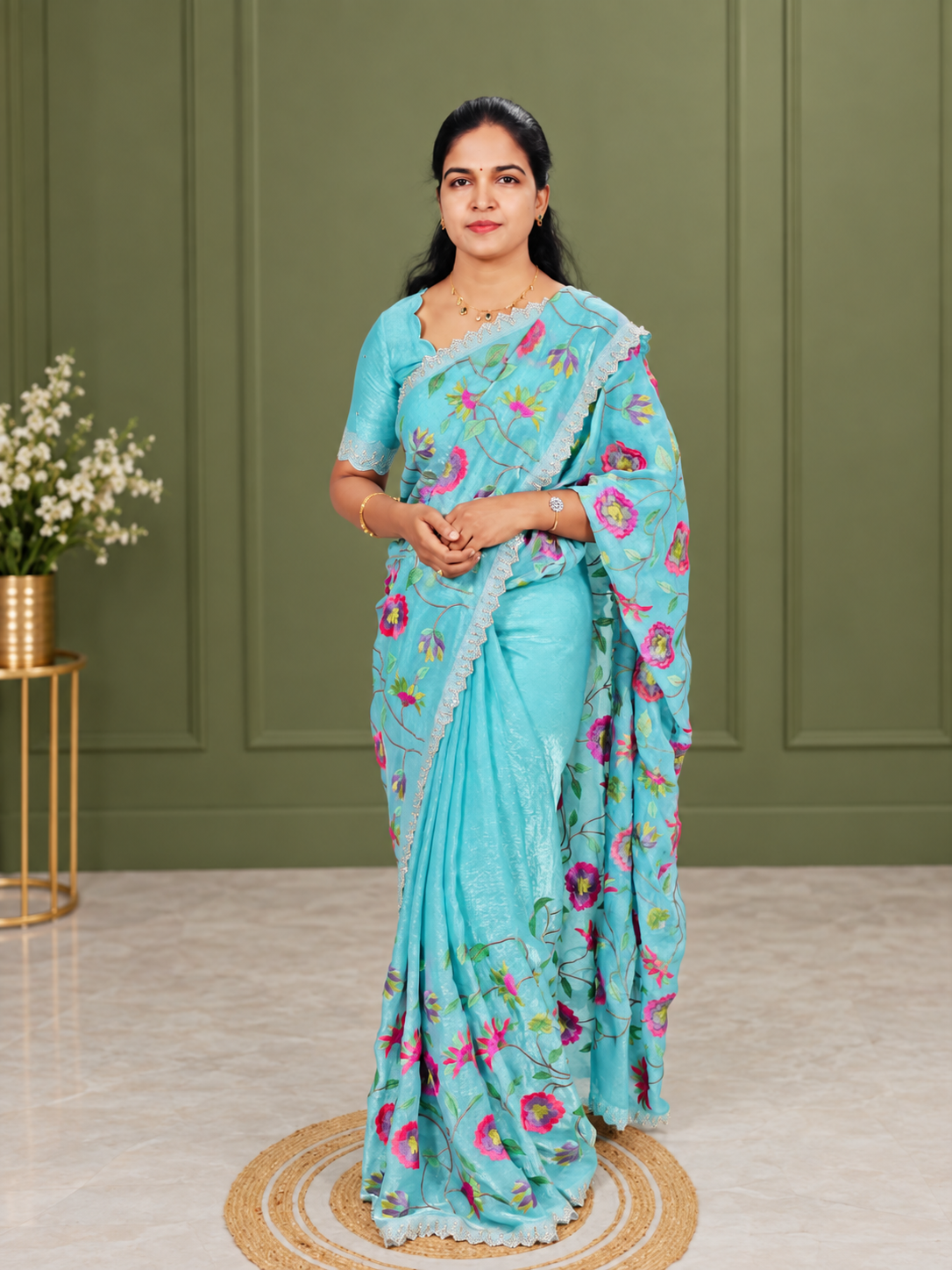 A sky blue embroidery saree with matching embroidery blouse