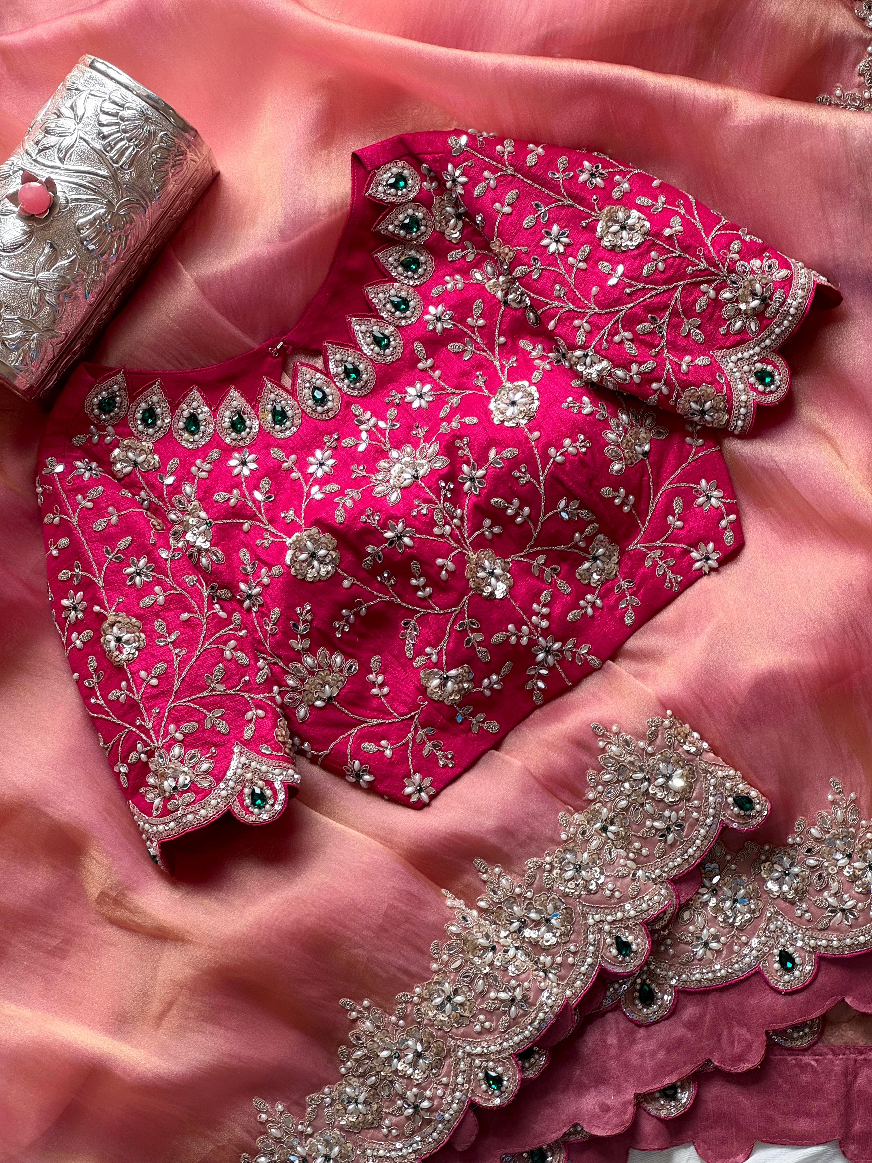 Onion Pink embroidered fabric with silver and green embellishments on a pink background